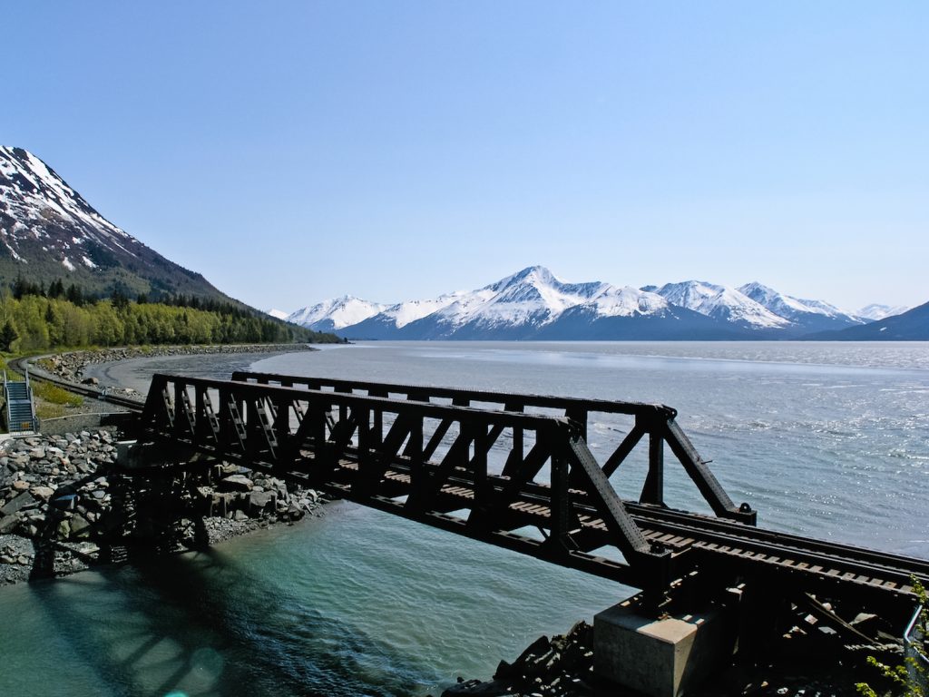 The Alaska Railroad's tracks wind through Turnagain Arm on the route from Anchorage to Seward