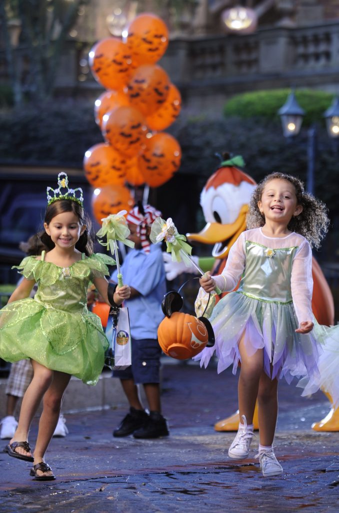 Girls Trick-or-treating at Mickey's Not-So-Scary Halloween Party