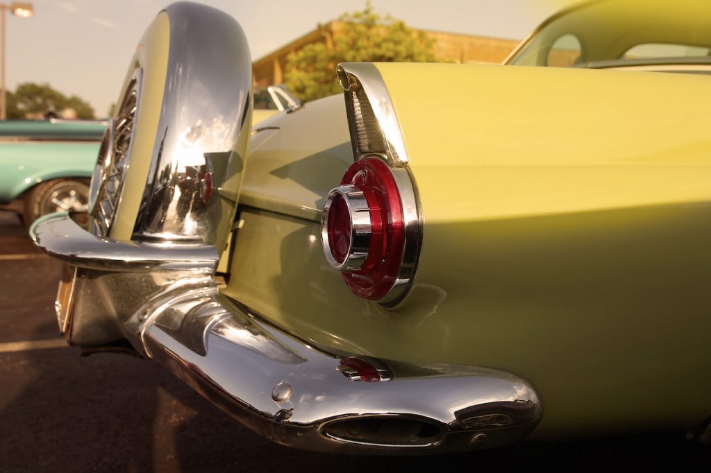Close up of classic rear vintage yellow car 