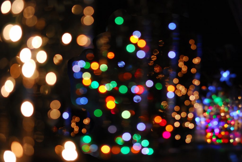 blurred christmas lights on dark background