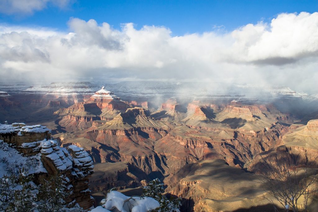Grand Canyon during winter, with light snow on the mountains 